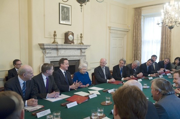 Queen Elizabeth II makes historic visit to 10 Downing Street and sits with Prime Minister David Cameron at the UK government weekly cabinet meeting, 18 December, 2012.